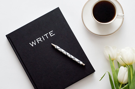 Coffee and Journal Stock Photo
