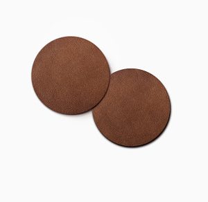 two dark brown leather coaster